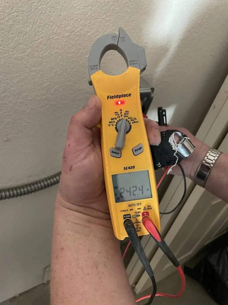 Voltage testing with clamp meter during Recessed Lighting Installation in South Holland
